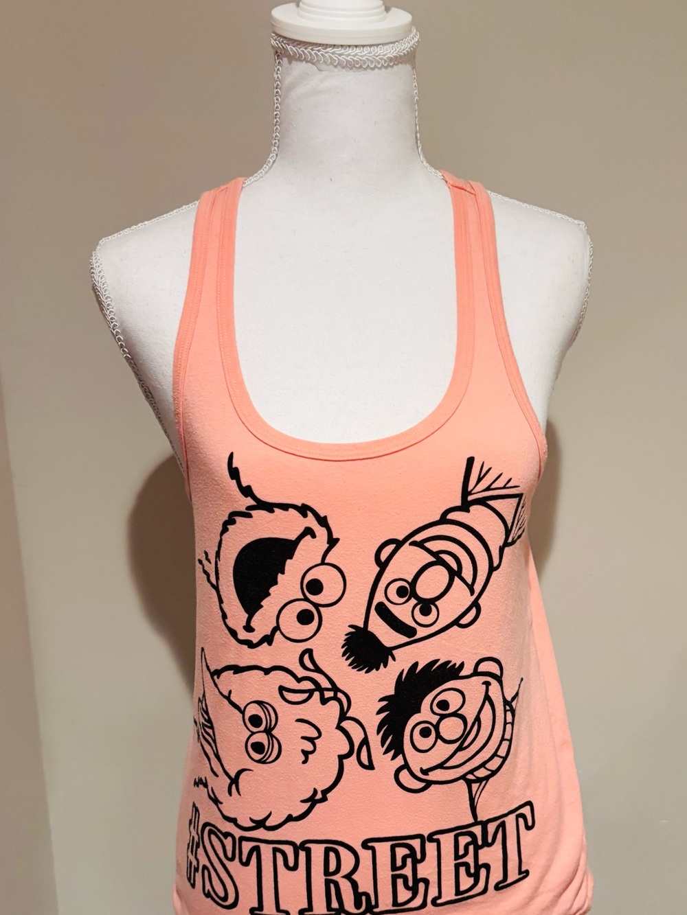 Sesame Street Peach Racerback Tank with Black Character Print